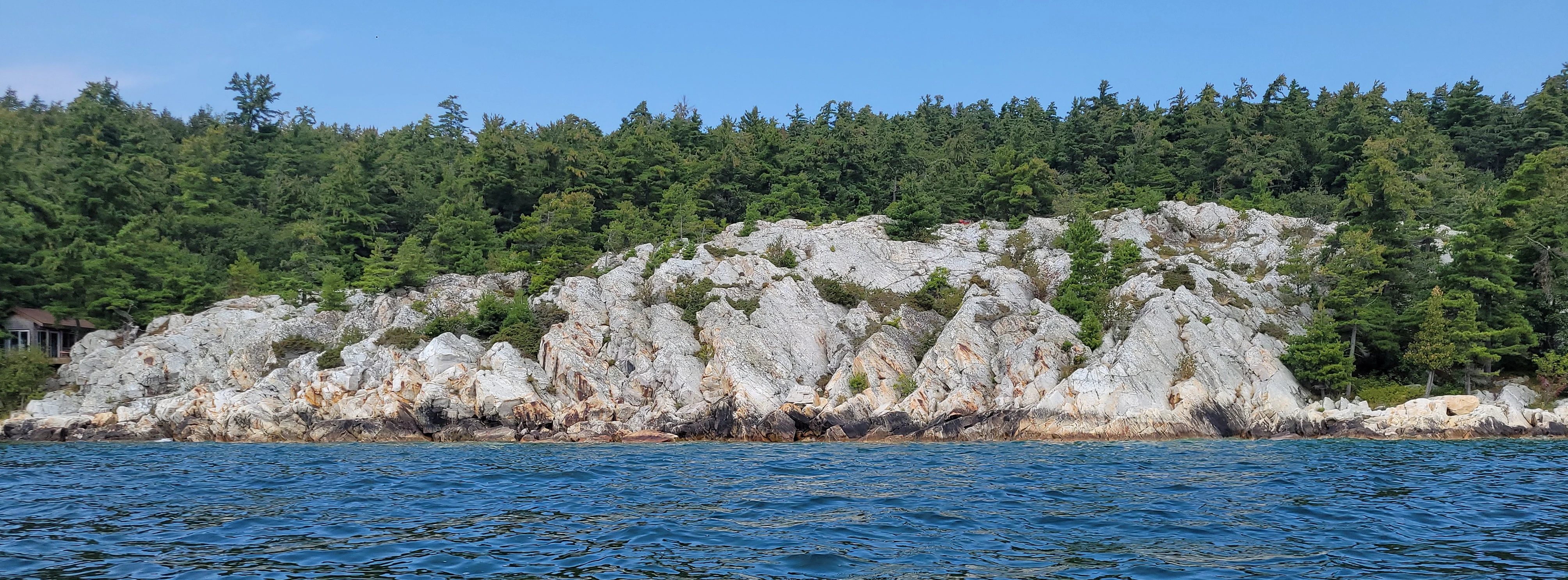 White quartzite shoreline near the entrance to Killarney Bay